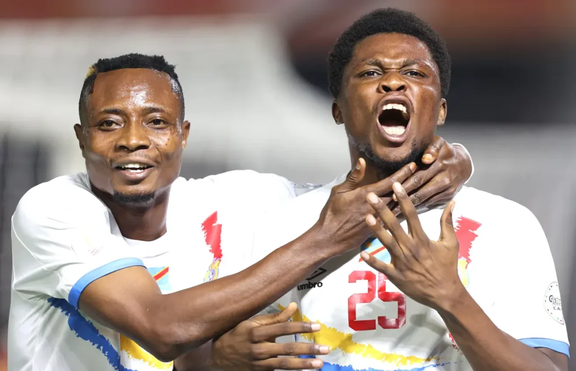 kaluo-mokonzi-katumbwe-of-dr-congo-celebrates-goal-with-teammates-during-the-2024-african-nations-championship-chan-football-match-between-angola-and-dr-congo