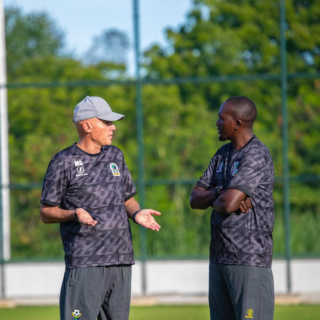 Kocha wa Taifa Stars Miguel Gamondi na Kocha Msaidizi Ahmad Ally wakijadiliana wakati wa mazoezi